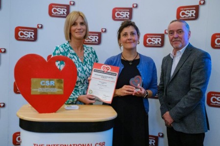 Photo showing the public health team collecting the award.